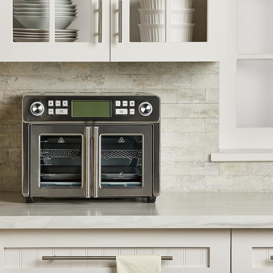 Emeril Lagasse Dual Zone Oven: 25QT air fryer oven, dual cooking zones, fast cooking, French doors, large capacity.