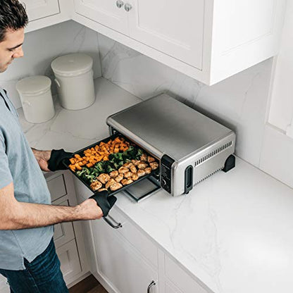 Ninja SP101 Oven: digital 8-in-1 air fryer oven, XL capacity, flip-up design, fast cooking with multiple accessories.