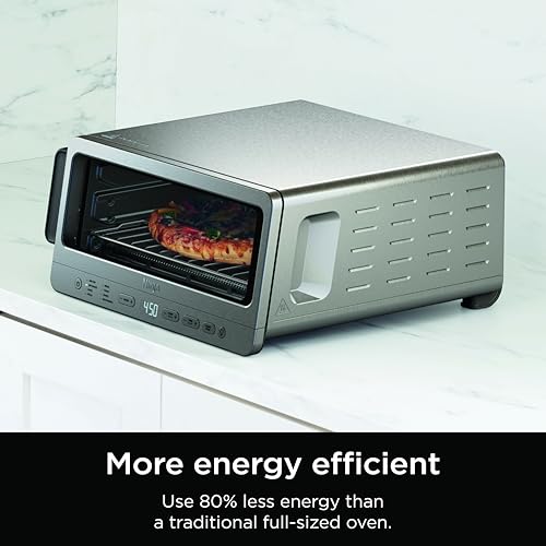 Ninja SP151 Oven: 8-in-1 air fryer toaster oven, flip-up design, space-saving, includes basket, pan, and rack.