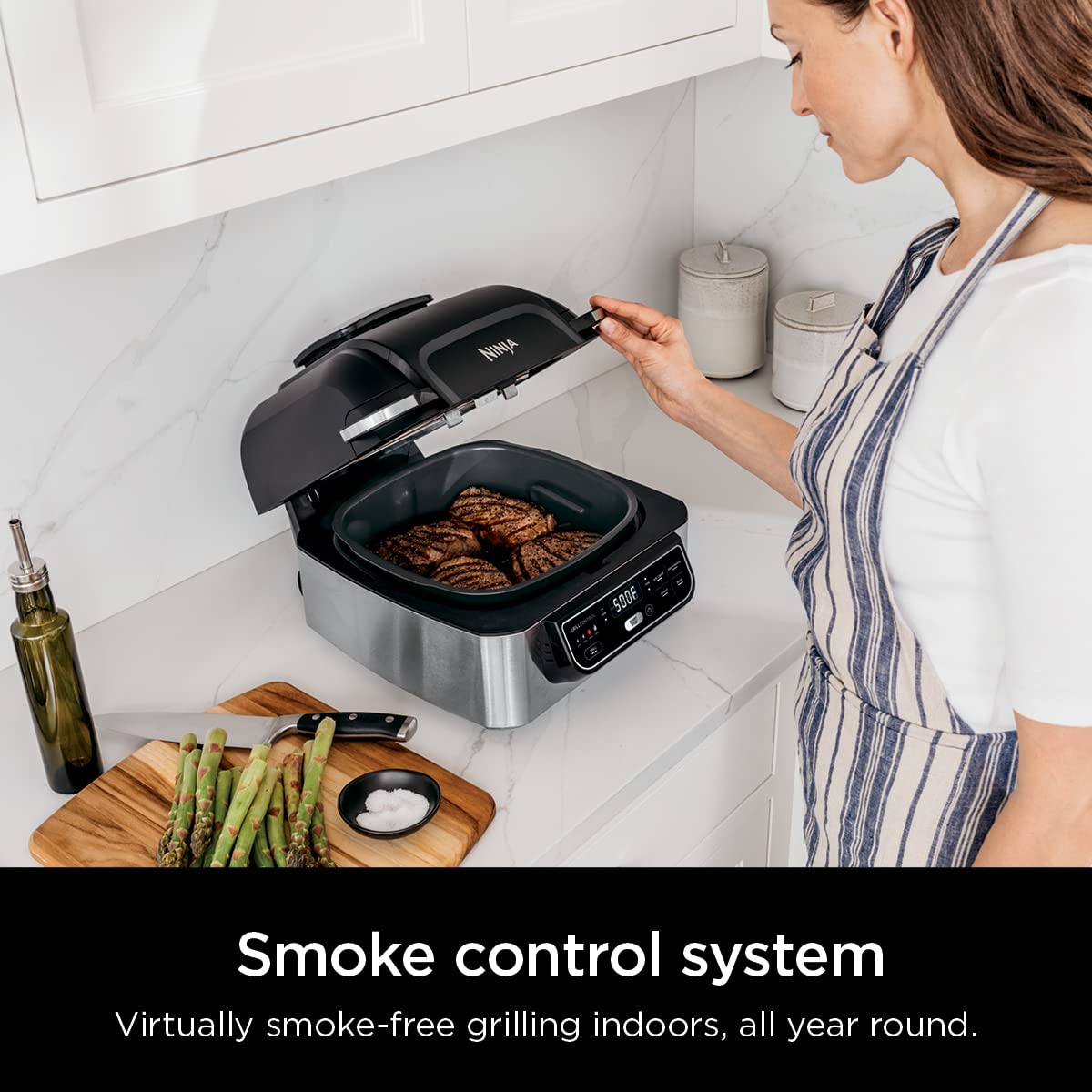 Ninja Foodi AG301 Grill: 5-in-1 indoor grill, air fry, roast, bake, dehydrate, smoke control, easy cleaning design.
