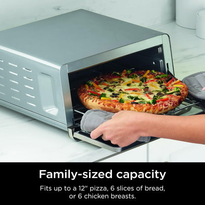 Ninja SP151 Oven: 8-in-1 air fryer toaster oven, flip-up design, space-saving, includes basket, pan, and rack.
